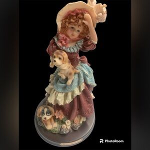 Unique collections, vintage, girl, holding puppy with dog standing beside her